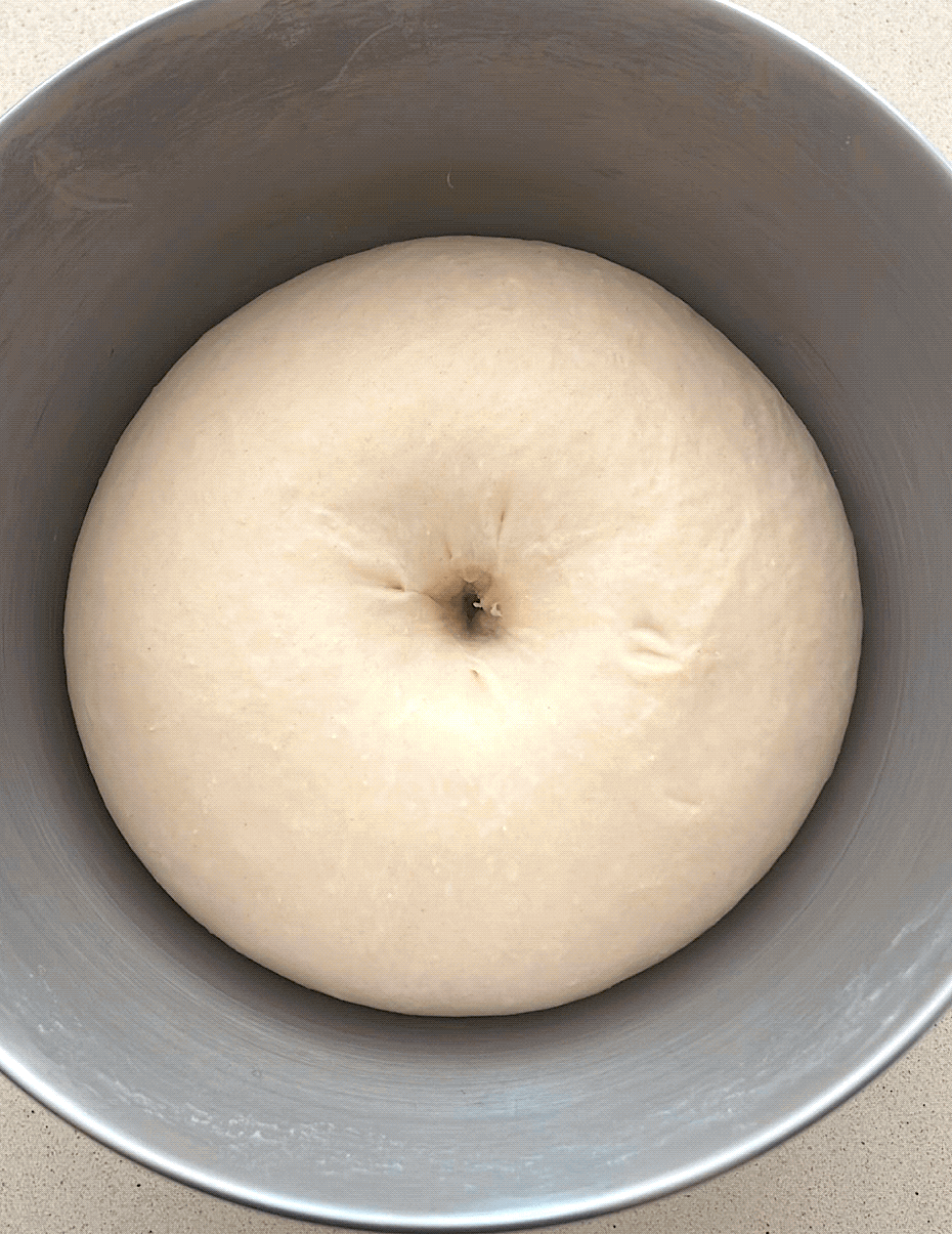 A hole forms in the dough, indicating it's fully proofed