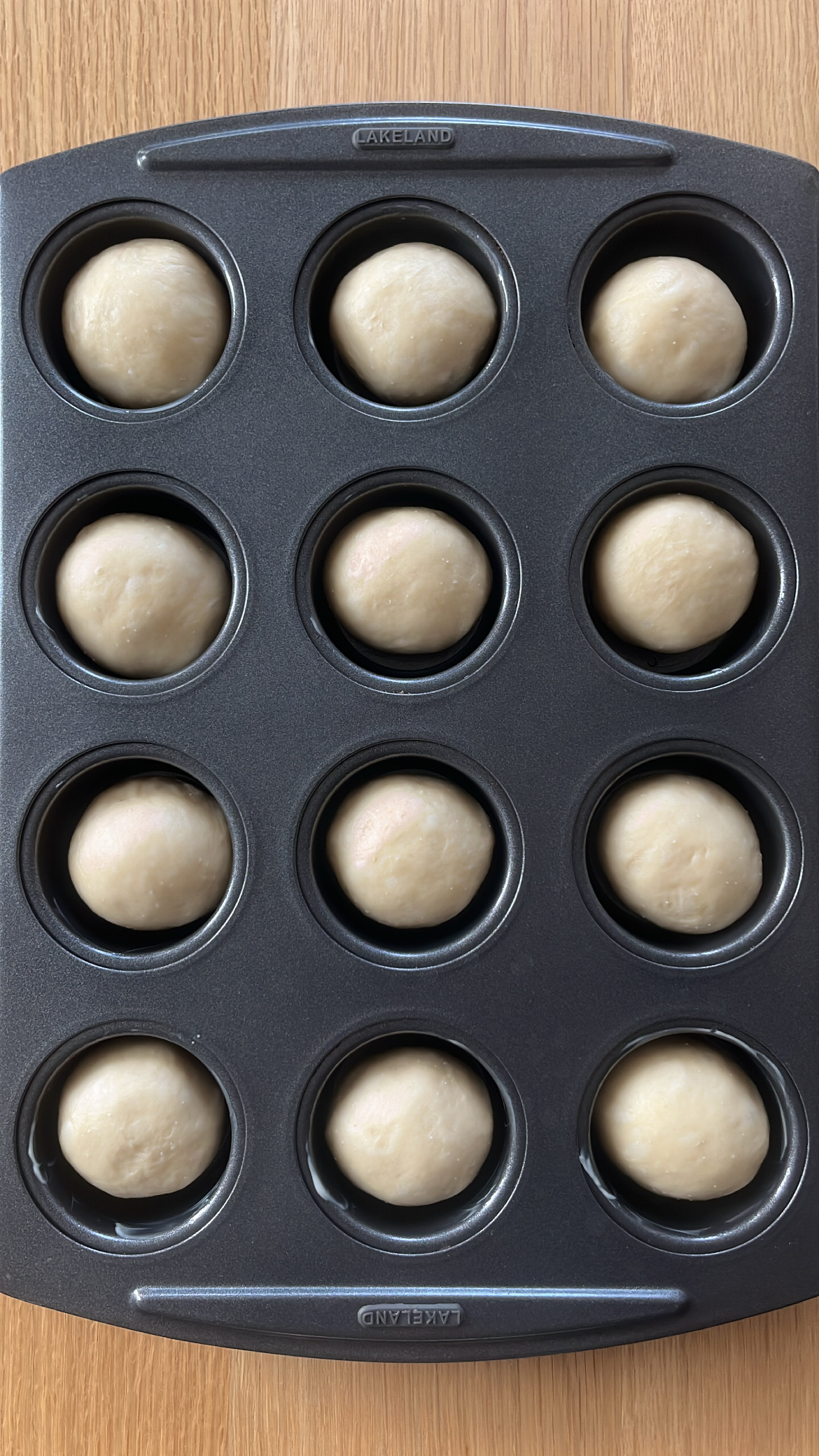 Shaped dough portions in the baking tray