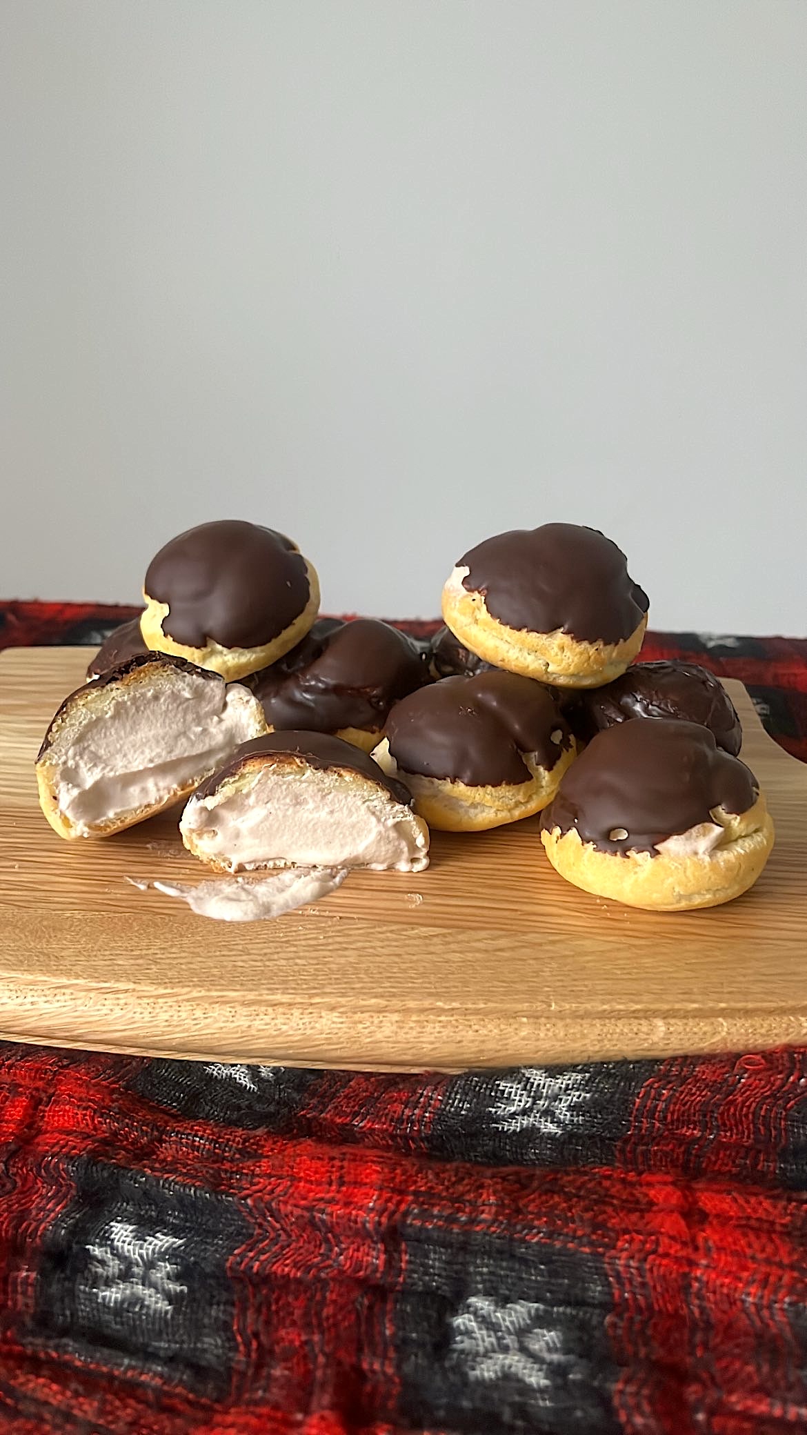 Choux pastry with chocolate on top and choco cream inside