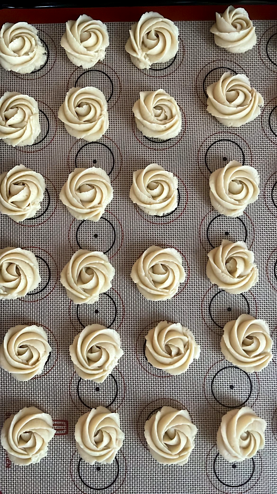 Piped flower-shaped batter to be chilled in the refrigerator