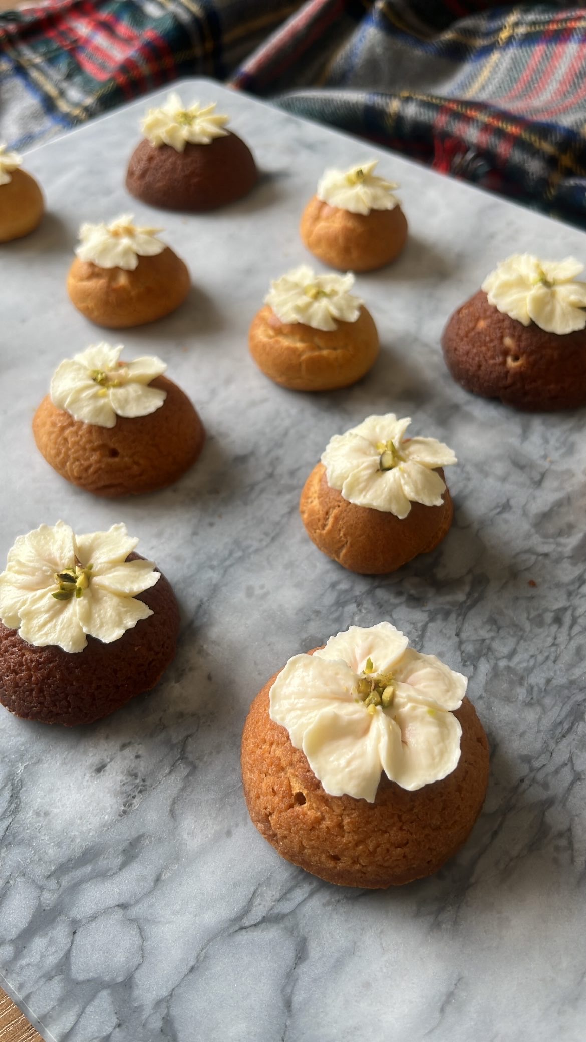 Choux Pastry with flower-shaped cream decoration on top